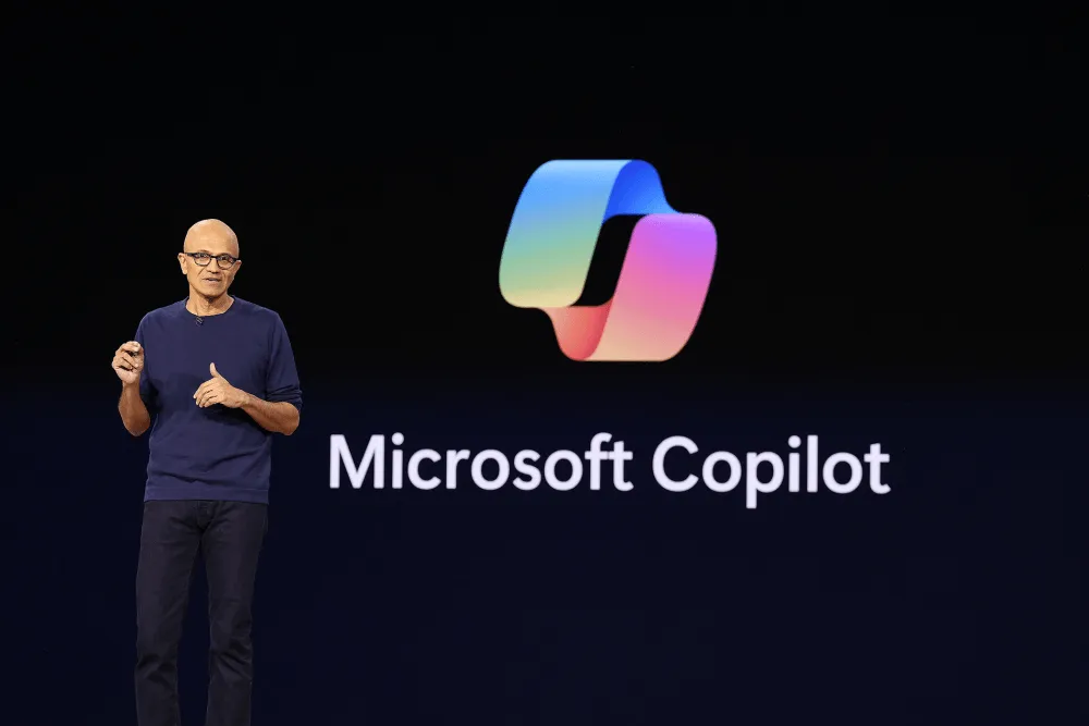 Illustration from TechCrunch: Microsoft's Satya Nadella calls for an 'emergency brake' and external controls on advanced AI models