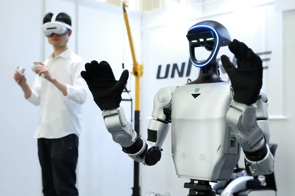 Illustration from TechCrunch: Former Nvidia robotics marketer Amulya Vishwanath, now a VC, says robotics is in a 'Lego era' and not yet at its ChatGPT moment