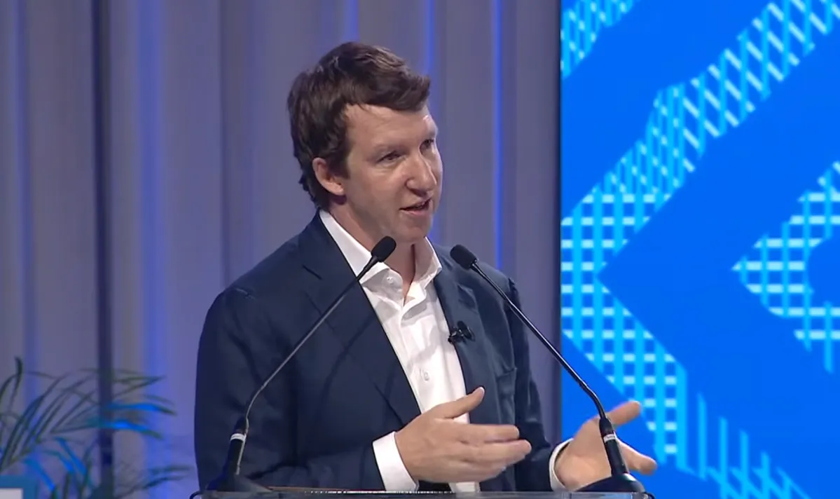 Illustration from Import AI: Jack Clark tells the IMF the singularity has arrived, citing GPT-6-Astra's 49-of-50 score on a new theoretical-physics benchmark